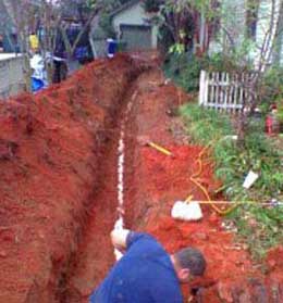 Traditional open trench sewer line replacement